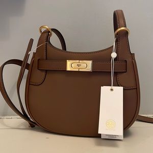 NWT. Tory Burch Lee Radziwill Small Saddlebag. Color is moose. Comes with bag.